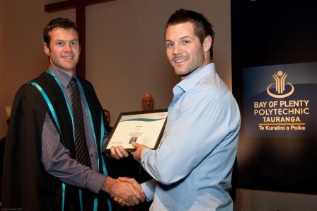 Carpentry Group Leader Brian Dillon with graduate Troy Davy.